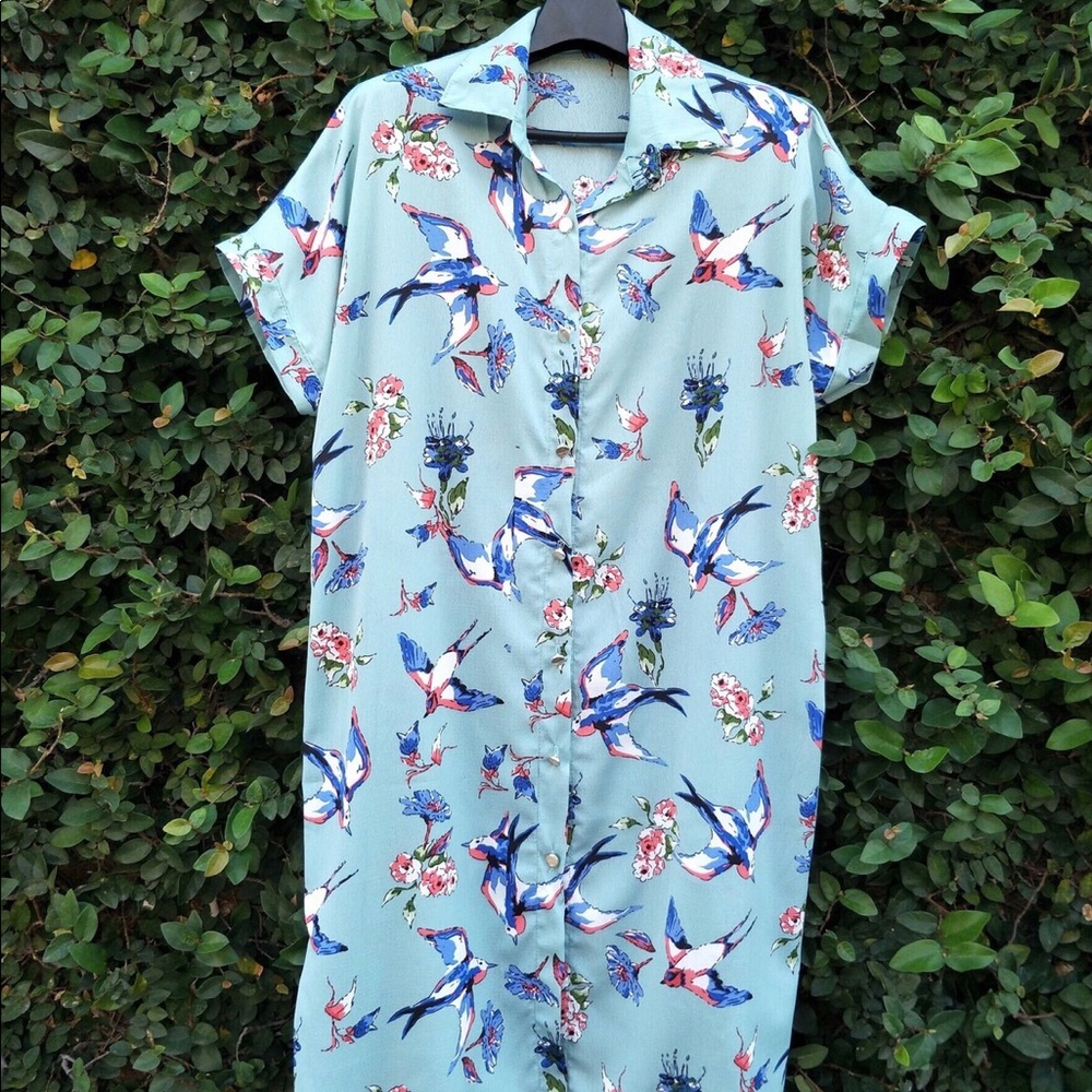 Long shirt with front buttons.